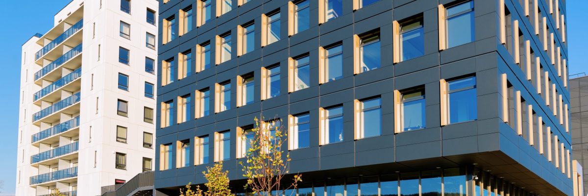 Modern business corporate office building. Blue sky